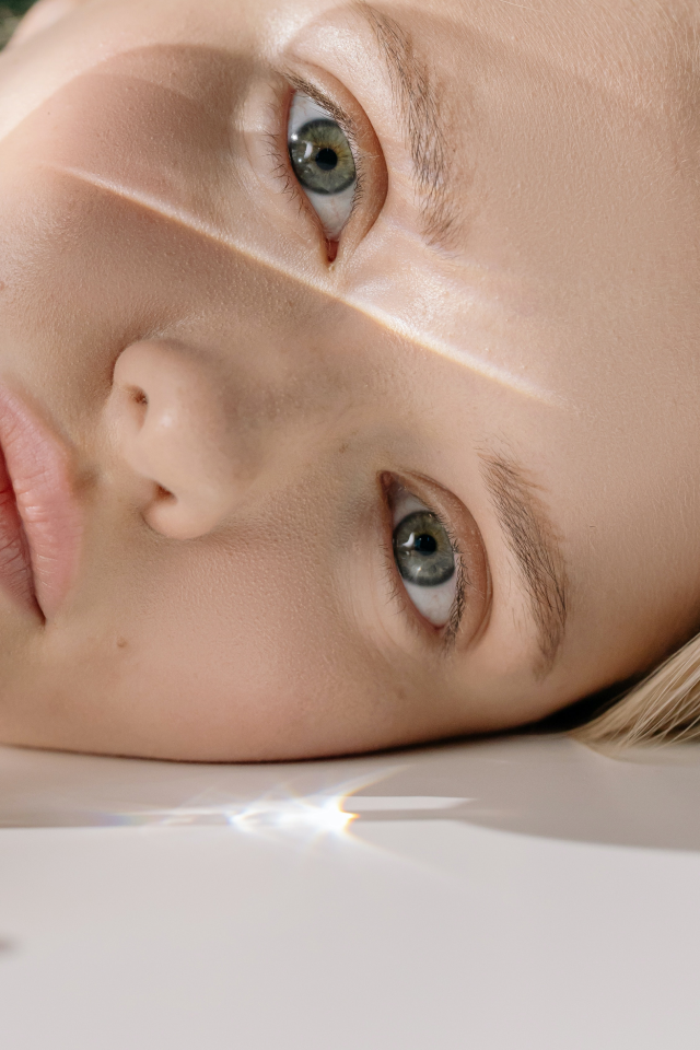 Close up of a women with clean organic vegan makeup on her face.